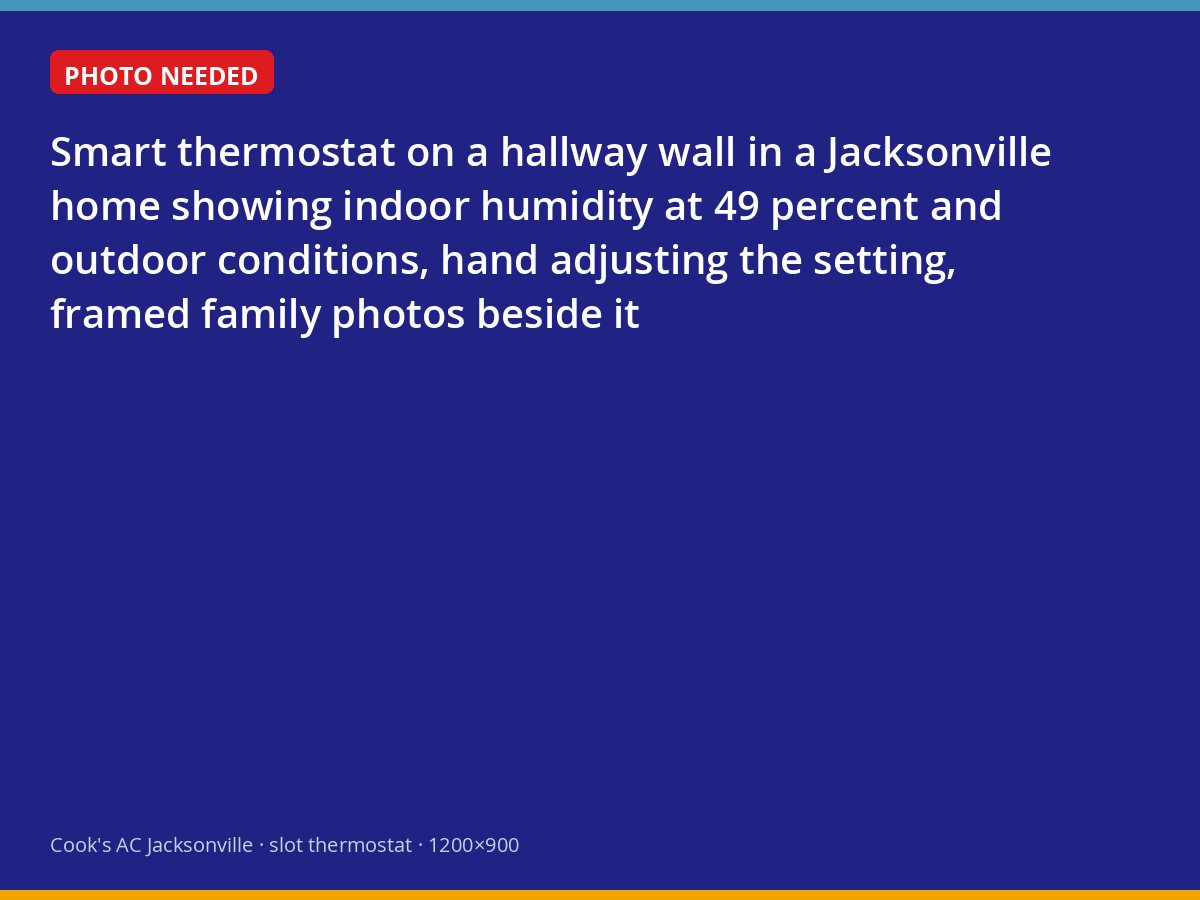 Smart thermostat displaying indoor humidity and outdoor weather in a Jacksonville hallway