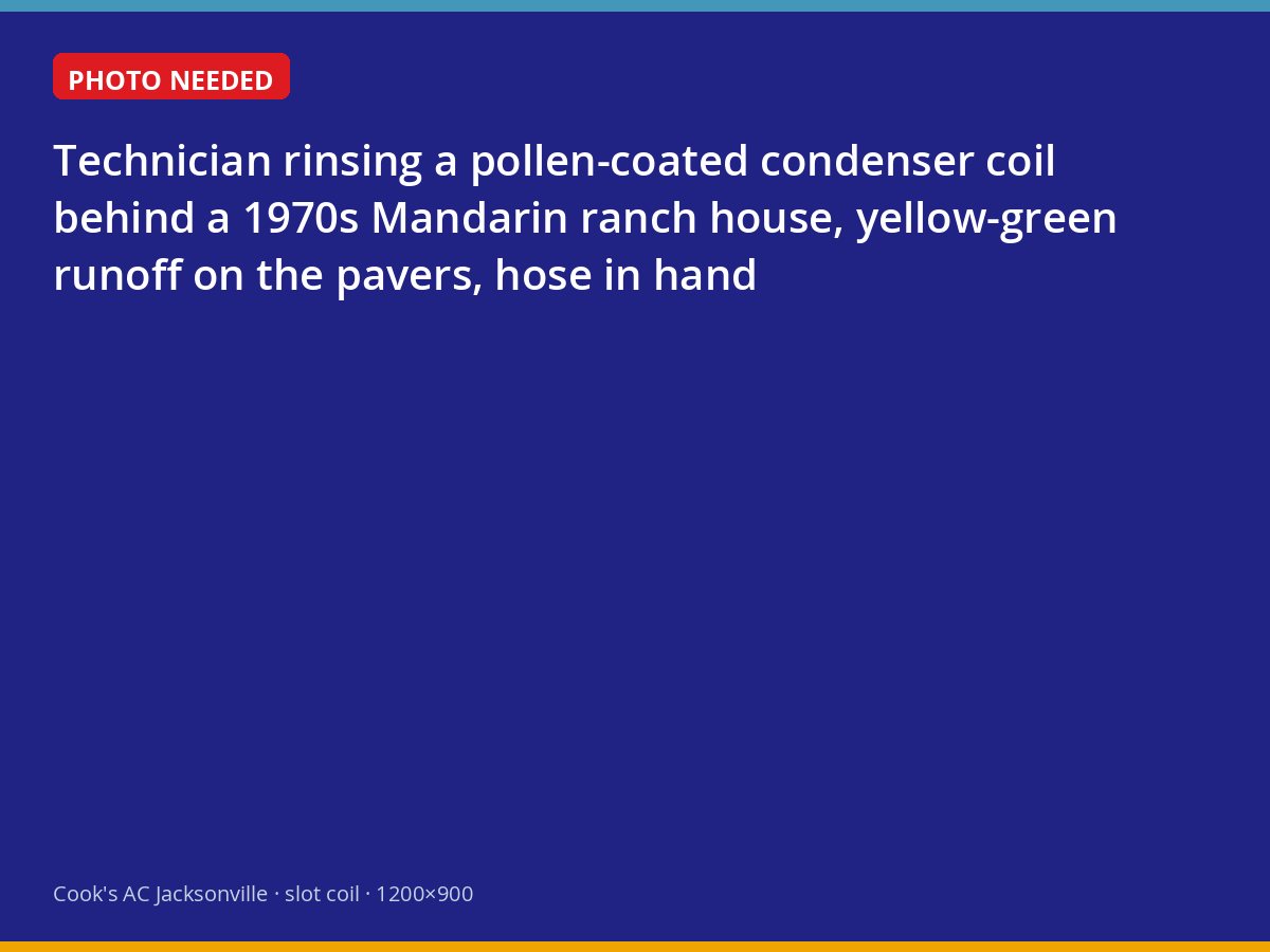 Technician washing spring pollen off an outdoor air conditioner coil in Mandarin